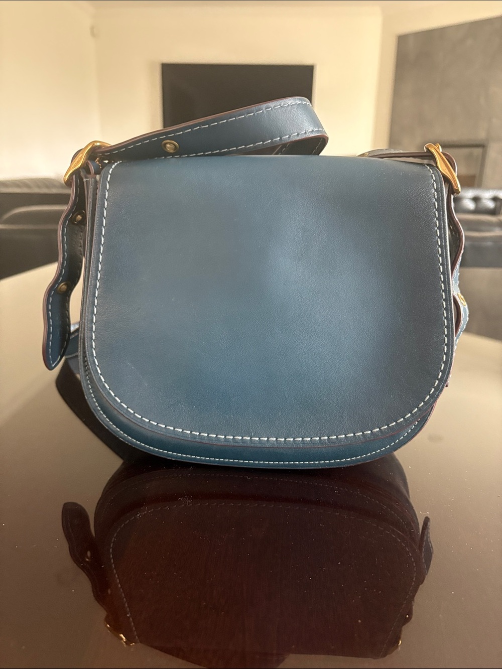 COACH 1941 Saddle 23 glovetanned leather. Blue. Antique gold hardware.